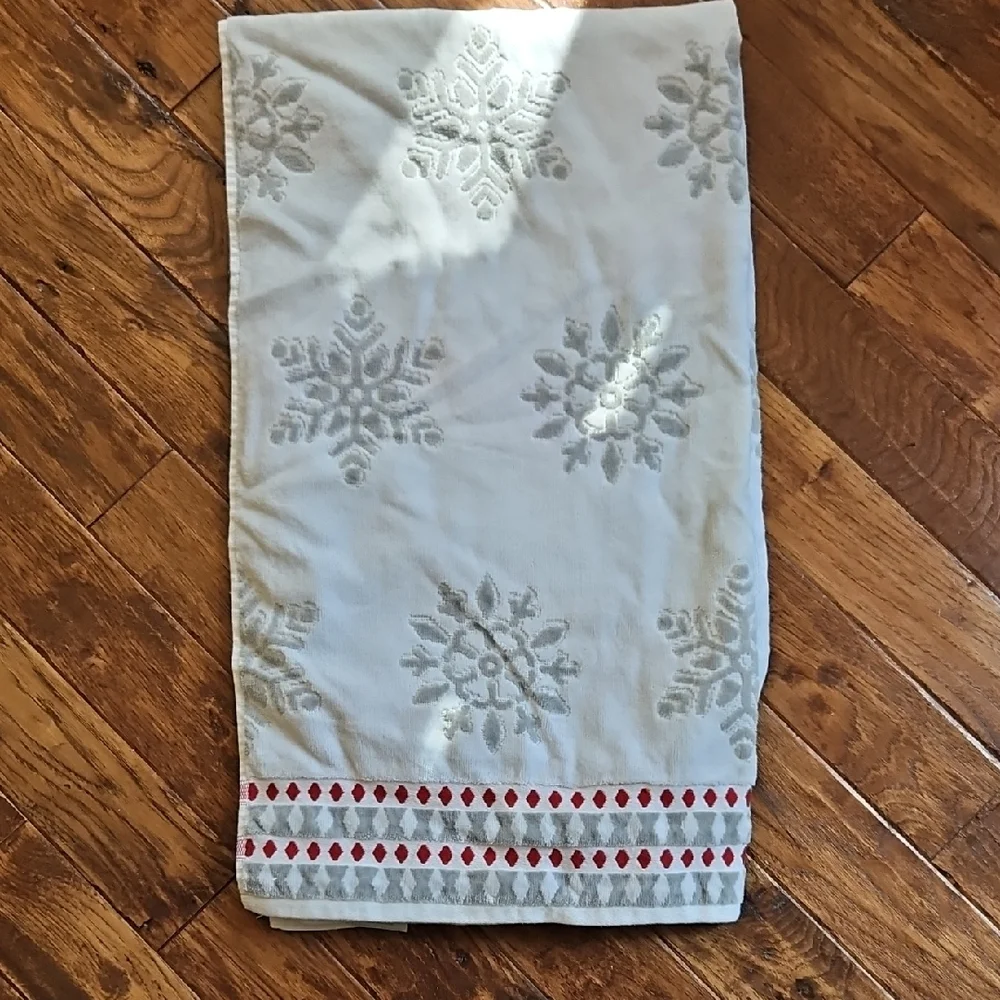 Snowflake Patterned Towel with Red Accents
